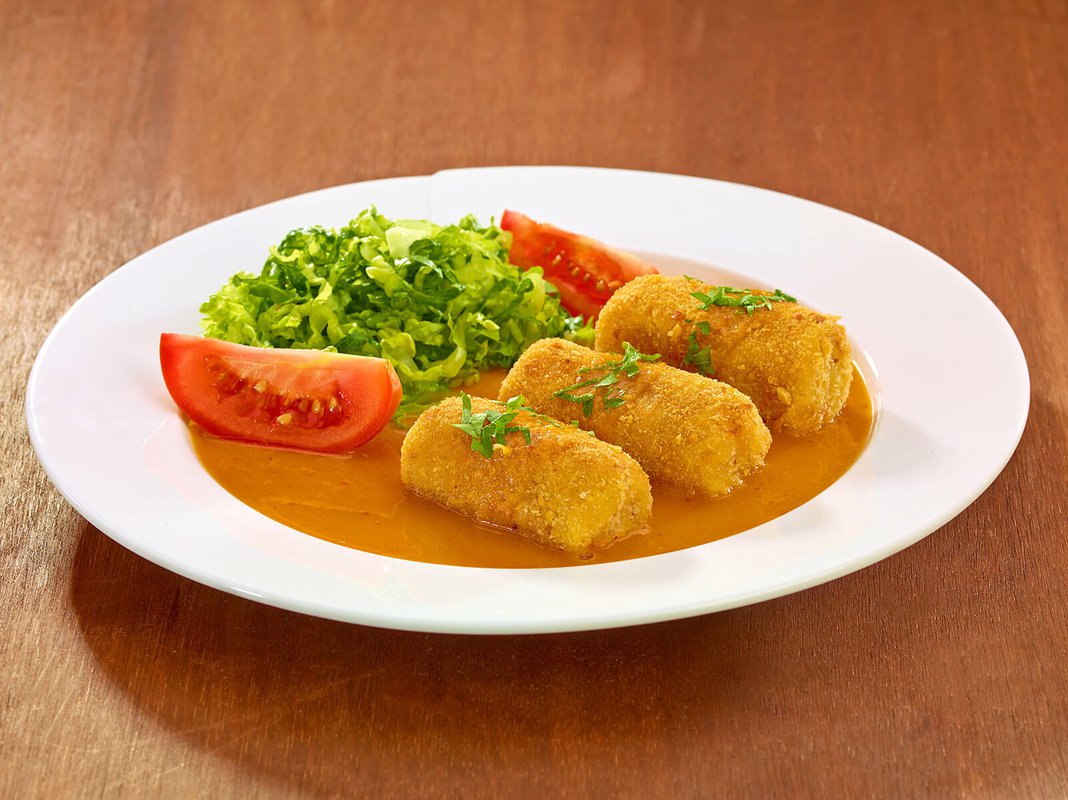 Croquetas de chicharrón prensado en salsa de elote al chipotle