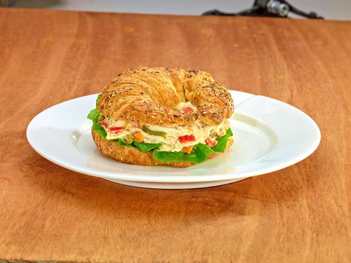 Whole wheat croissant with vegetables and chicken